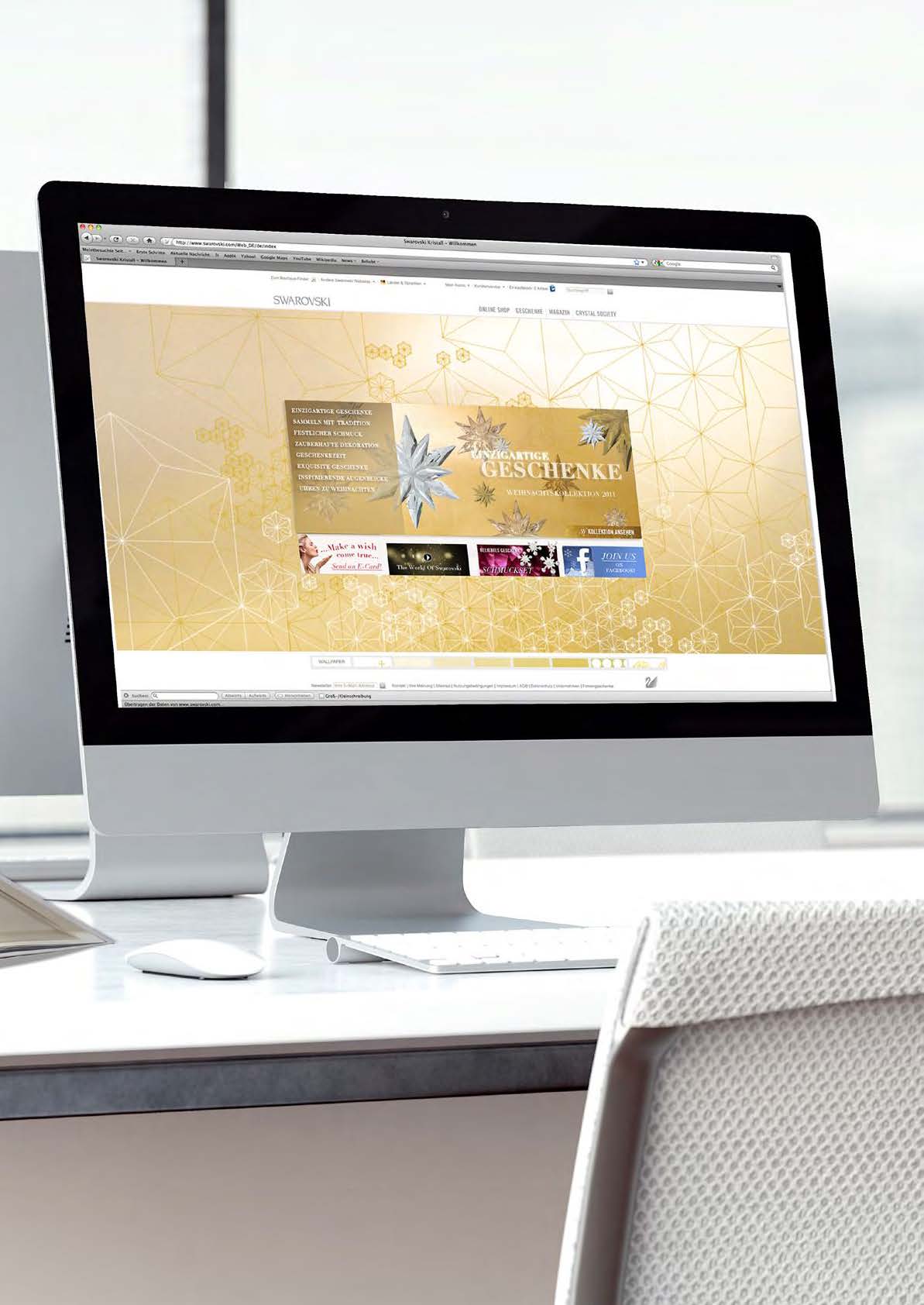 Swarovski Weihnachtskampagne auf einem Desktop-Bildschirm, entworfen von MORE PIOUS STUDIOS